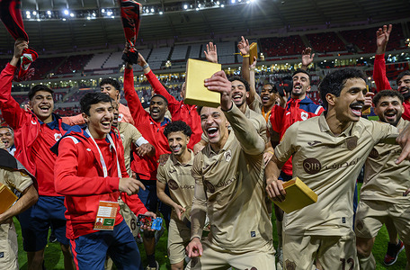 Al Rayyan SC players seen celebrating with the trophy after winning the AGCFF Gulf Club Champions League Final football match between QatarÕs Al Rayyan SC and Saudi Arabia's Al-Shabab SC at Ahmad bin Ali Stadium. Final score; Al-Rayyan SC 3 : 0 Al-Shabab SC.