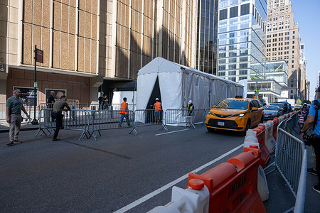 Workers install an arrival tent outside Madison Square Garden to shield guests from paparazzi amid widespread speculation that the arena is hosting Taylor Swift and Travis Kelce rumored wedding on July 02, 2026 in New York City.