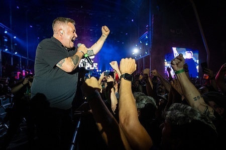 Vocalist and bassist Ken Casey of the American Celtic‑punk band Dropkick Murphys performs during the second day of the Vilar de Mouros Festival, marking the final show of their tour.