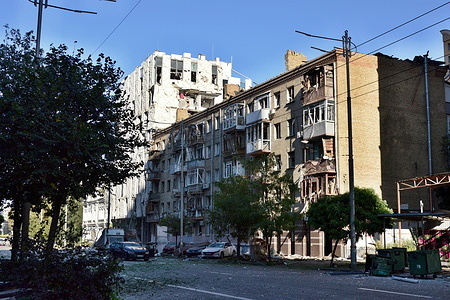 A residential building and a shopping center in the Holosiivskyi district are damaged during a Russian attack. Russia launched a large-scale, combined missile and drone attack on Ukraine, with a primary focus on Kyiv, resulting in at least 21 civilian deaths and dozens wounded.