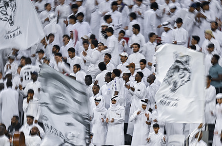 Supporters of Al-Sadd SC cheer for the team during the Qatar Stars League match between AL-Sailiya SC and Al-Sadd SC at Al Bayt stadium. 
Final score Al Sadd SC 3 : 1 Al-Sailiya SC