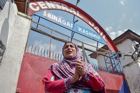 A woman seen crying during the riot breakout inside the Central Jail in Srinagar, Kashmir.
Riots broke out inside a high security central jail in Srinagar after rumors of prisoners being shifted out of the Kashmir valley. Meanwhile, the authorities have suspended internet services and imposed restrictions in old city of Srinagar.
