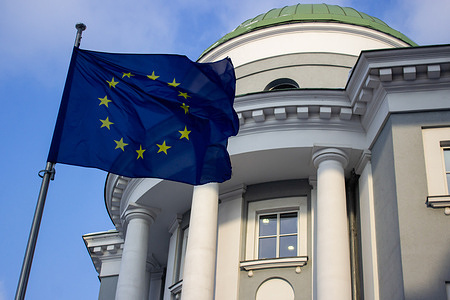 The European Union (EU) flag is seen next to the building occupied by the Delegation of the European Union in Russia. The EU is reportedly preparing to introduce new sanctions against Russia starting February 23, a year after the war in Ukraine started.