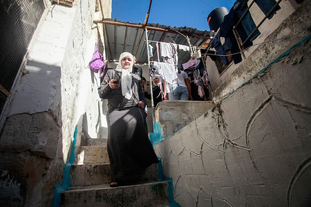 Mother of detained Palestinian Mujahid Akouba during a military operation. Israeli forces raided a house in the old town in the center of Nablus, in the West Bank. Palestinian residents reported that the army shot the fighter Mujahid Akouba, who is wanted by the Israeli army and its intelligence, during the military operation. The army arrested Akouba while he was suffering from gunshot wounds.