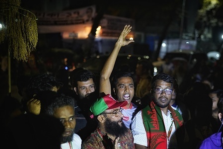 Supporters of the Bangladesh Nationalist Party (BNP) celebrate in front of the party’s central office, expressing optimism as early results indicate they are leading in the national parliamentary election. The election will determine the country's next government as millions of voters head to the polls amid heightened political tension and security concerns.