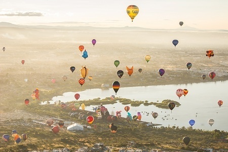 An aerial view of several Hot Air Balloons are seen as the City of Leon in Guanajuato hold the Hot Air Ballon International Festival from November 17th to 20th, 2015 where pilots of aerostatic balloons from International level participate.