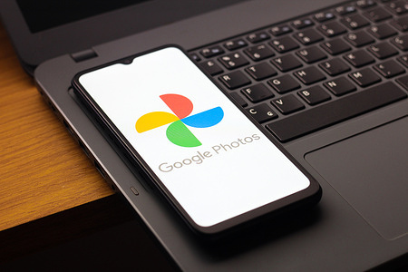 In this photo illustration, the Google Photos logo is seen displayed on a smartphone screen.
