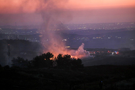 A view of a fire set by a group of Jewish settlers in the village of Tell, west of Nablus. A group of Jewish settlers attacked crops and olive trees, causing a large fire that spread to homes in the Israeli settlement of Havat Gilad, west of Nablus in the West Bank.