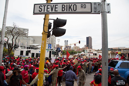 Crowd of protesters seen at Steve Biko road during the demonstration.
Members of Economic Freedom Fighters (EFF) take part in a labour march to the Department of Labour and SASSA offices targeting employers who have not paid their employees under the claims of the COVID-19 Temporary Employer-Employee Relief Scheme (TERS).