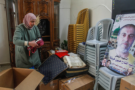 The wife of the Palestinian Abdel-Fattah Kharusheh prepares to evacuate her house after the Israeli army took the dimensions of the house in preparation for its demolition. Kharusheh carried out the shooting attack on two Jewish settlers on February 26 in the town of Hawara, south of Nablus, in the West Bank. Khrusheh was killed in Jenin camp during a military operation by the Israeli army.