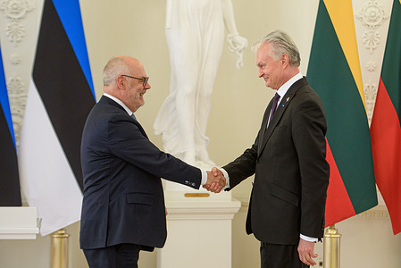 Lithuanian President Gitanas Nauseda and Estonian President Alar Karis shake hands after a joint press conference at the Presidential Palace. Estonian President arrived in Lithuania on April 15 for a two-day state visit. In Vilnius, he met with Lithuanian President Gitanas Nauseda, after which the two leaders signed a joint declaration and addressed the media at a press conference.