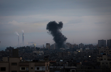 Smoke rises following an Israeli air strike in Gaza City.