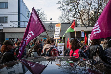 Protesters pass the embassy of the USA on the way to the Polish parliament during an anti-fascist demonstration. Activists and protesters joined an anti-fascist demonstration in Warsaw on the occasion of the UN's International Day for the Elimination of Racial Discrimination. Marching under the banner of World Against Racism, the protesters marched from Plac Centralny under the Palace of Culture and Science to the Polish parliament with banners, flags, and placards.