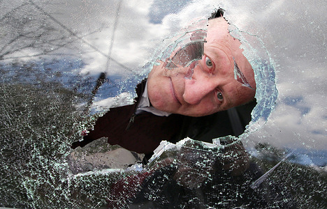 A Palestinian looks out of the window of a Palestinian vehicle after it was stoned by Jewish settlers. Jewish settlers, known as "Hilltop Youth," attacked a Palestinian family walking in their fields in the village of Beit Mirin, north of Nablus in the West Bank, injuring three people who were taken to An-Najah Hospital in Nablus.