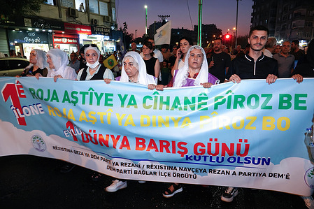 A banner saying "Happy September 1 World Peace Day" in Turkish and Kurdish is seen being carried during the march. While peace talks continue in Türkiye between Abdullah Ocalan, the imprisoned leader of the Kurdish organization PKK and the Turkish state, September 1 World Peace Day was celebrated with a march held in Diyarbakir with the participation of thousands of people. The march was organized by the Amed Labor and Democracy Platform which consists of many democratic society institutions, Kurdish parties and organizations.