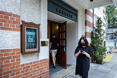 A man walks into the Foreign Correspondent's Club on Lower Albert Road, Hong Hong. Hong Kong's Foreign Correspondents Club has scrapped its annual human rights press awards just days before it was due to announce winners, out of fear it would violate the city's wide-ranging national security law.