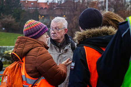 Protestors have a discussion behind the police cordon. The Last Generation (Ostatnie Pokolenie) initiates blockades on a main trunk road in Warsaw, Wislostrada, to protest against Donald Tusk's climate policies. The blockades on this road have continued for the past 2 weeks and are designed to raise awareness of the climate crisis through sustained, non-violent disruption. The groups are demanding that the government shifts 100% of the money allocated for new expressways to regional public transport, and introduces a low-cost, 50PLN ticket for public transport throughout Poland. The series of road blocks take place on the week that Polish students return to school. "People must demand change" they state, "Otherwise the government will continue to disregard our basic safety."