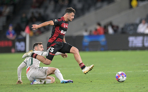 Dylan Dean Scicluna (front) of Western Sydney Wanderers FC and Nikola Mileusnic (back) of Wellington Phoenix seen in action during the 2025/26 Isuzu Ute A-League Men Round 17 match between Western Sydney Wanderers FC and Wellington Phoenix FC held at the Commbank Stadium. Final score Western Sydney Wanderers 2:2 Wellington Phoenix FC.