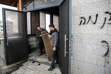 A Palestinian man shares his mobile phone footage from security cameras showing the settlers' attack on the Abu Bakr al-Siddiq Mosque and set it on fire. Jewish settlers wrote Hebrew graffiti on the walls in the village of Tell. Palestinian residents reported that a group of settlers started the fire around midnight and residents rushed to extinguish it.