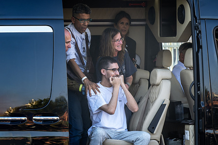 Evyatar David, a released hostage who previously appeared in a Hamas video showing signs of severe starvation, was seen emotionally greeting his family and friends upon arrival at Beilinson Hospital. His loved ones gathered to welcome him after his release from Hamas captivity. The last hostages held by Hamas for two years returned to Israel following President Trump’s deal and the end of the war. They were taken to Beilinson Hospital immediately after landing.