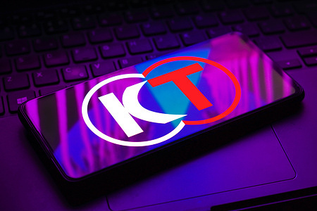 In this photo illustration, the Koei Tecmo (KT) logo is displayed on a smartphone screen.