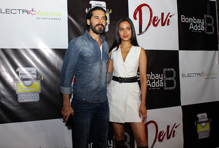 MUMBAI, INDIA - MARCH 12, 2020: Dino Morea and a guest attend the success party of short film ‘Devi’.