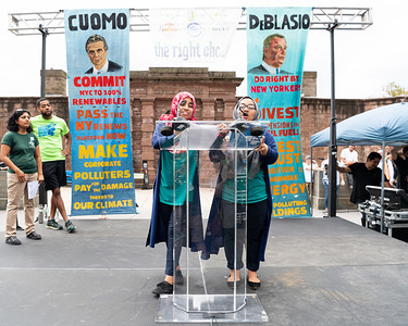 Two muslims women seen speaking to the protesters during the New York Rise for Climate, Jobs, and Justice march in New York City.
