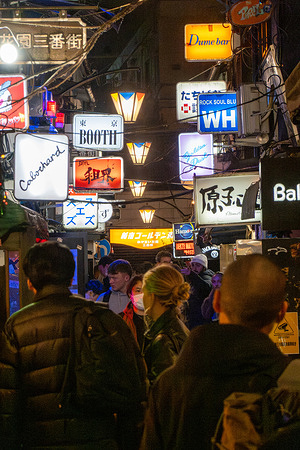 People walk through a narrow alley lined with bars and neon signs in the Golden Gai district of Shinjuku Golden Gai in Shinjuku is a compact nightlife district made up of narrow alleys lined with tiny bars, each with its own distinct theme and character. Known for its intimate atmosphere and retro feel, it remains a popular spot for locals, creatives, and visitors looking for a more authentic Tokyo night out.