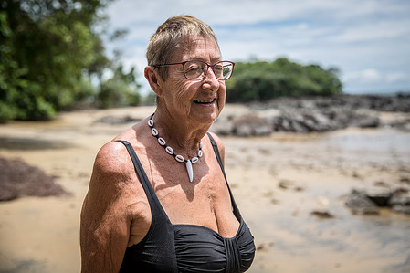 Jane Aspden, a local landowner, seen at Black Johnson beach. Sierra Leone's government sold one of its most precious ecotourism assets, the 100-hectare pristine forest and beach at Black Jhonson, for around USD 55 million. This was being sold to a Chinese state-owned enterprise for the construction of a fishing harbour. According to the authorities, this project will allow tuna vessels and other fishing vessels to anchor which could bring more fish to local markets and increase export capacity. However, locals say this project is a human and ecological disaster as it will force the residents to relocate, fishers will be unable to fish and the market will struggle to buy and sell. In addition, it will have a serious environmental impact, reducing fish stocks and causing pollution.