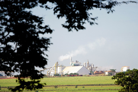 View of the Adecoagro Vale do Ivinhema Plant. Adecoagro Vale do Ivinhema Ltda., the operational holding company for the Brazilian subsidiaries of Adecoagro, specializes in the production of sugar and ethanol, electricity cogeneration and marketing, and trading agricultural products like cotton and rice. The company is expanding its infrastructure in Mato Grosso do Sul, specifically the Ivinhema and Angélica sugar mills, aiming to reach a crushing capacity of 13 million tons by 2023.