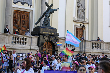 Participants with rainbow, bisexual, and transgender flags march past the Holy Cross Church. The Equality Parade 2025 in Warsaw marked the highlight of the city’s Pride celebrations, bringing together thousands to advocate for LGBTQ+ rights and celebrate diversity and inclusion.