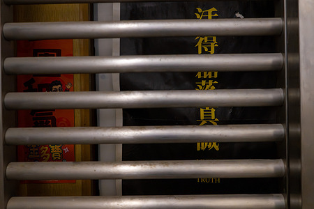 A poster reading " living in truth" is seen on the door of the bookshop store Have a Nice Stay. Hong Kong’s national security police searched, Have a Nice Stay bookshop in Prince Edward and Greenfield Book Store in Mong Kok and arrested five people suspected of committing a sedition offence. The five have been detained for investigation.
