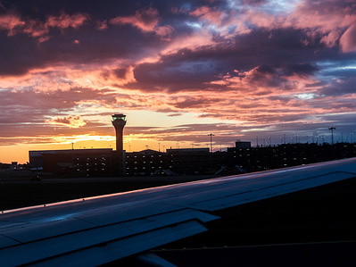 The aviation security tower is seen during sunset at London Luton Airport.