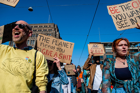 A group of protesters shout slogans against climate change while holding placards during the demonstration. Three years after the first global school strike, signs of the youth climate movement’s success are everywhere. #FridaysForFuture is a movement that began in August 2018, after 15 year old Greta Thunberg sat in front of the Swedish parliament every school day for three weeks, to protest against the lack of action on the climate crisis. In Amsterdam, not just students, but teachers, and climate activists, gathered in the city center to keep demanding better climate policy and to stop the destruction of the lands of MAPA (Most Affected Peoples and Areas).
