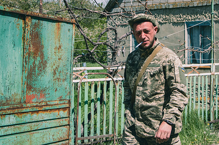 A Ukrainian soldier is smoking a cigarette. Ukrainian soldiers are at the frontline in the village of Novoivanovk, Dnepropetrovsk region. Russian troops concentrated their efforts on this area and tried to invade deeper into the country.