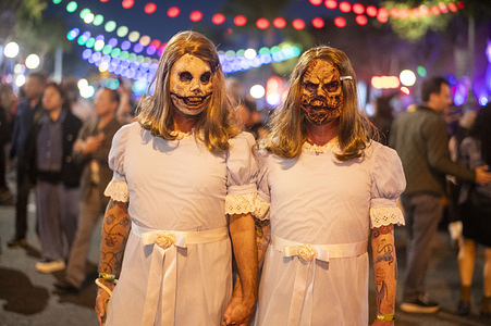 People attend the West Hollywood Halloween costume carnival at Santa Monica Boulevard.