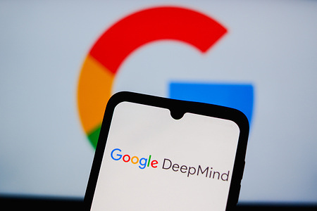 In this photo illustration, the Google DeepMind AI logo seen displayed on a smartphone and in the background.
