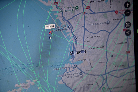 In this photo illustration, a screen displaying real-time air traffic shows a Canadair aircraft conducting surveillance flights over forest areas near Marseille. During periods of heatwaves and drought, the Civil Security service uses a Canadair aircraft to monitor and respond to any fire outbreaks in the forest areas near Marseille, France.