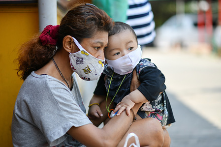 A mother and son wear face masks as a preventive measure against the spread of coronavirus in Bangkok.
The Ministry of Public Health of Thailand recorded 2,551 COVID-19 patients, 1,218 recovered and 38 dead.