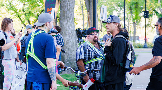 Followers of Sean Feucht, a US song-writer and preacher permitted to perform and preach on the Alberta Legislature grounds attempt to instigate an incident prompting security to have to step in. The LGBTQIA2s+ community set up a counter protest and was met with followers praying that they would be healed.