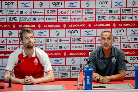 Lukas Hradecky (L) and AS Monaco coach Adi Hutter (R) seen during press conference. AS Monaco Football Club held a press conference to introduce its new goalkeeper Lukas Hradecky, signed from Bayer Leverkusen (Germany), at the club's Performance Center in La Turbie, France. AS Monaco Football Club will play its first match in France's Ligue 1 McDonald's championship on Saturday, August 16, hosting Le Havre Athletic Club at Stade Louis II.