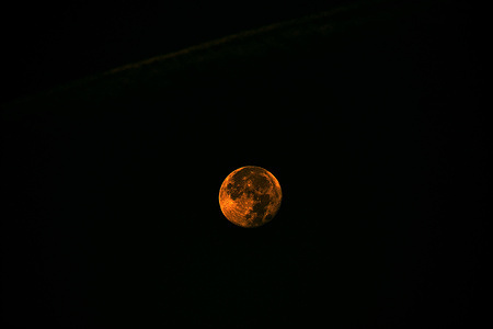 View of the Blue Supermoon in Marseille. The second full moon of August 2023, called a blue moon due to its rarity, lights up the sky with its orange color. This super blue moon which only appears every ten or twenty years is the last before 2037.