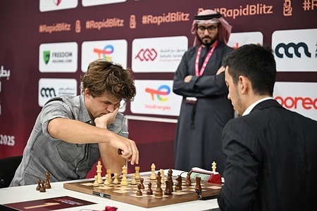Carlsen Magnus of Norway competes against Abdusattorov Nodirbek of Uzbekistan during the Blitz open final of the FIDE World Rapid & Blitz Championship 2025 at the Sports and Events Complex, Qatar University.