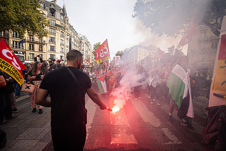 A demonstrator holds a flare during an inter union demonstration as part of a day of strikes and national protests organized by French unions for social and fiscal justice. The general strike on 2nd October saw lower turnout than the previous one on 18th September. According to the Ministry of the Interior, there were 195,000 participants with the CGT putting the figure at 600,000. The demonstration marched from Place Italie to Place Vauban without any incidents with the police. The French people, together with the inter-union groups continue to pressure Prime Minister Sebastien Lecornu against the austerity state budgets.