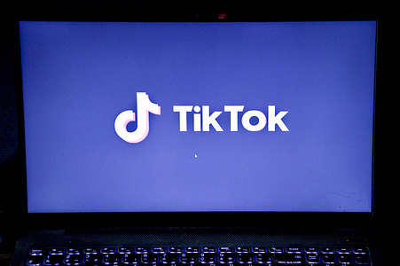 In this photo illustration, a TikTok logo is seen on a laptop screen. As announced on January 17, 2025, the Chinese social network TikTok suspended its services in the United States of America (USA) due to lack of guarantees from the administration of President Joe Biden.