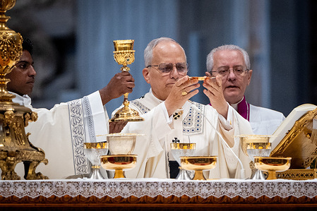 Pope Leo XIV performs the rite of Consecration during the Holy Mass on the Solemnity of Mary, Mother of God in St. Peter's Basilica.