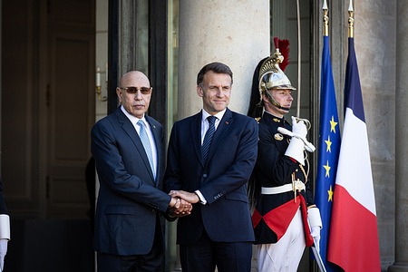 Emmanuel Macron, France's President, welcomes the President of the Islamic Republic of Mauritania Mohamed Ould Ghazouani at the Elysee Presidential Palace. The French President Emmanuel Macron welcomes the President of the Islamic Republic of Mauritania Mohamed Ould Ghazouani at the Elysee Presidential Palace