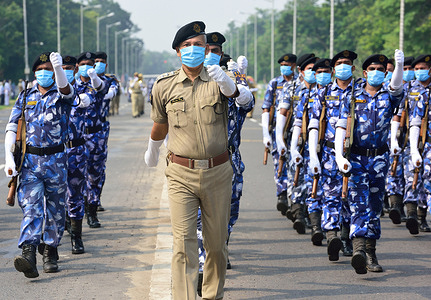 Police personnel rehearse while wearing face masks and gloves ahead of 74th Independence Day celebrations amid Coronavirus (COVID-19) crisis.