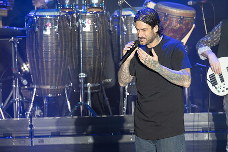 Ramon Melendi, known artistically as Melendi, performs during a concert at the "Christmas By Starlite" Festival at Ifema in Madrid.