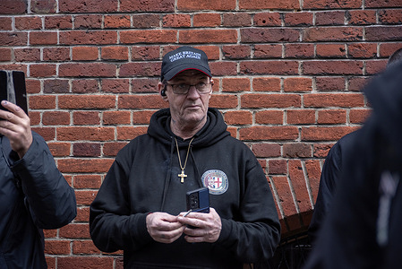 A far-right attendee of the meeting of the Advance UK wears a "Make Britain Great Again" baseball cap outside the Emmanuel Centre in London. A small group of Stand Up To Racism gathered outside the Emmanuel Centre in central London. Activists protested against the meeting of the far-right political party called Advance UK (formerly known Integrity Party). The party led by Ben Habib, former Deputy Leader of the Reform UK and recently joined to the party Stephen Christopher Yaxley-Lennon better known as Tommy Robinson.